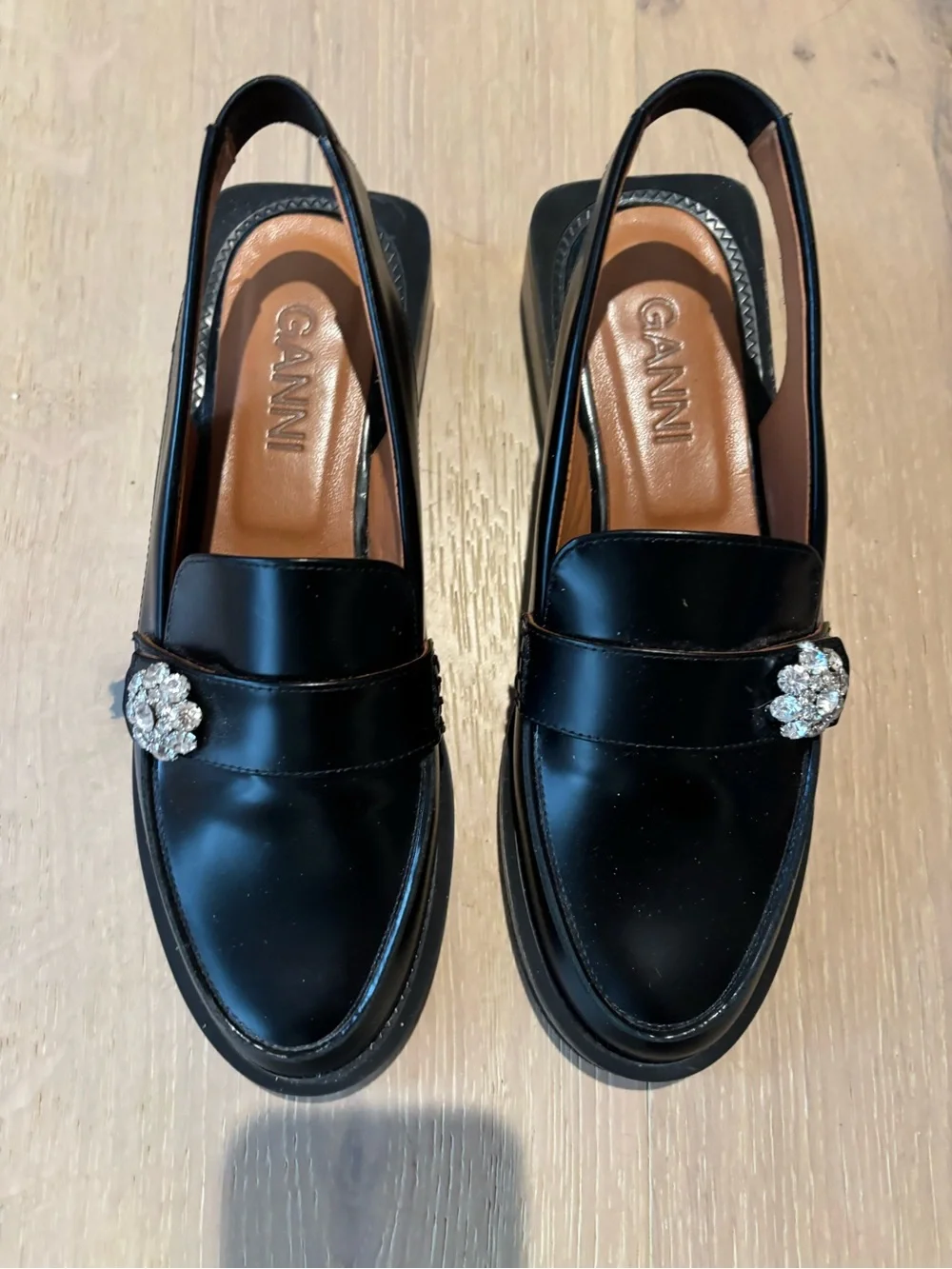 Ganni Black Leather Slingback Loafers with Crystal Brooch